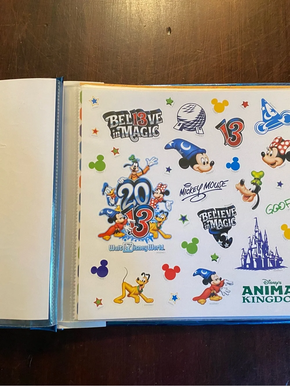 NWT Collectible Walt Disney World 2013 Slip-In Scrapbook Bound Blue Multicolor